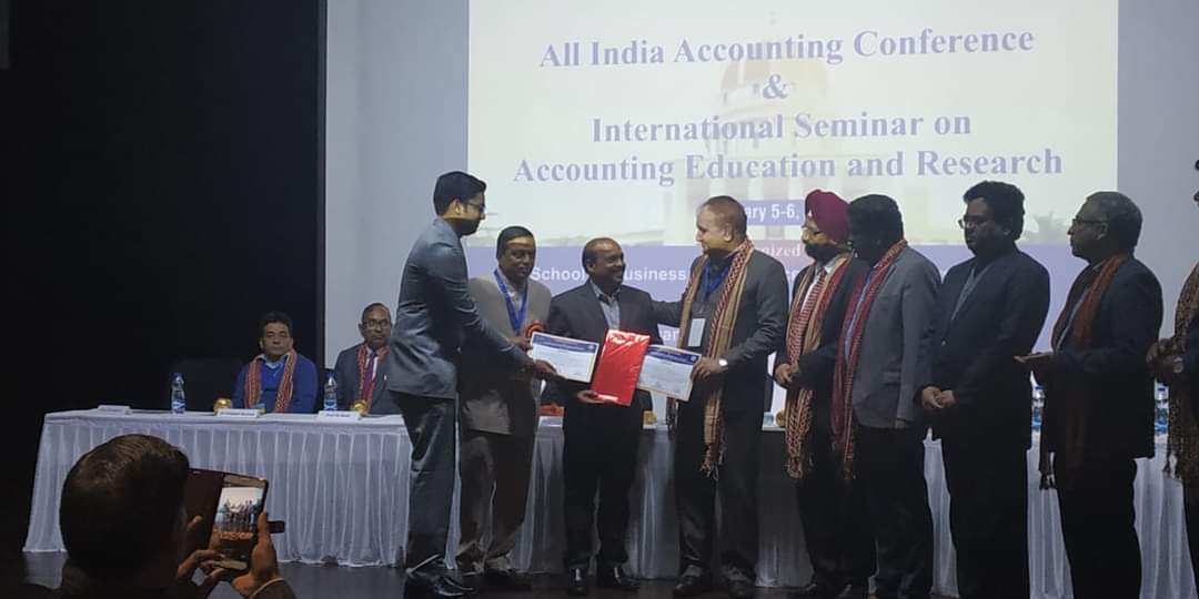 Mr. Himanshu Agarwall M.Phil. Research Scholar and Dr. Rabindra Kumar Swain Getting Best Paper Award  